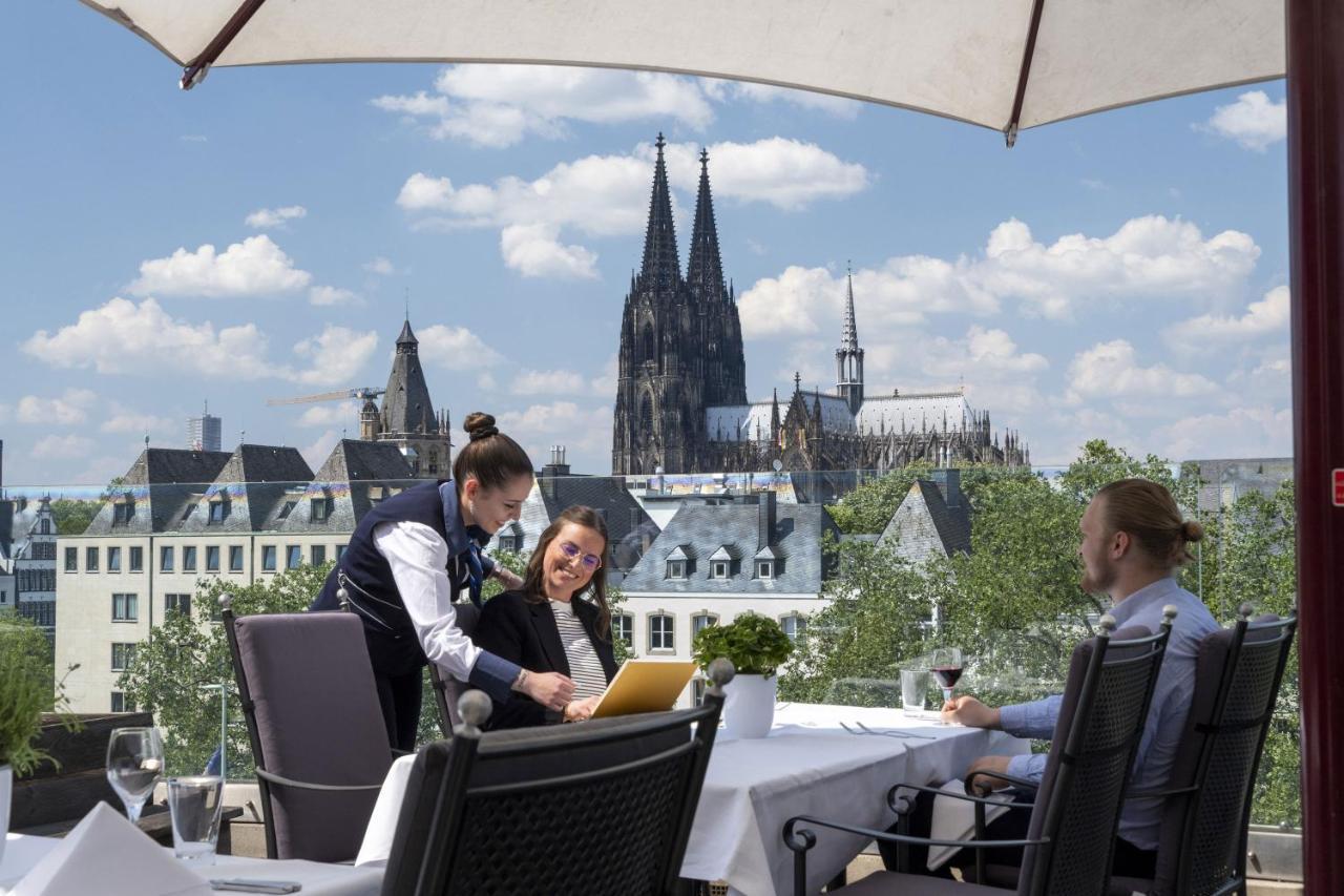 Maritim Hotel Koln Ngoại thất bức ảnh The view from the terrace of the restaurant